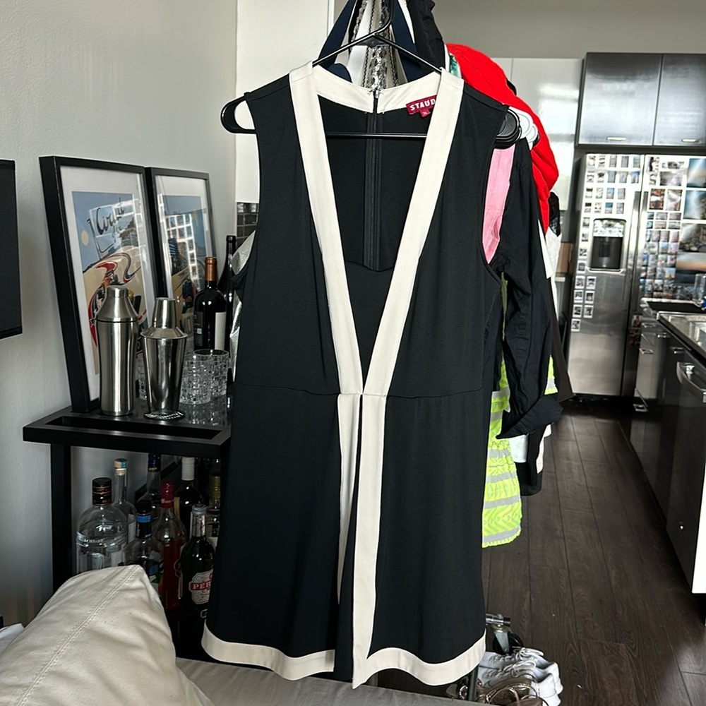 Staud tennis dress in black and white w/ built-in shorts & zip closure in back.